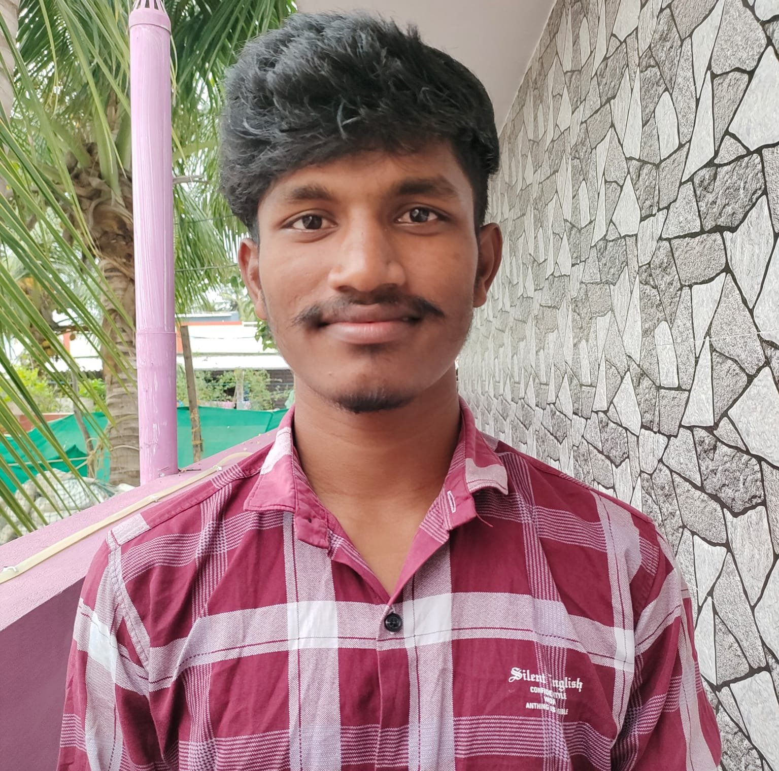 Dhoni John